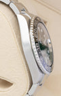 Left side profile view highlighting the polished and brushed stainless steel case wall on a preowned 2013 Rolex GMT-Master II reference 116710LN