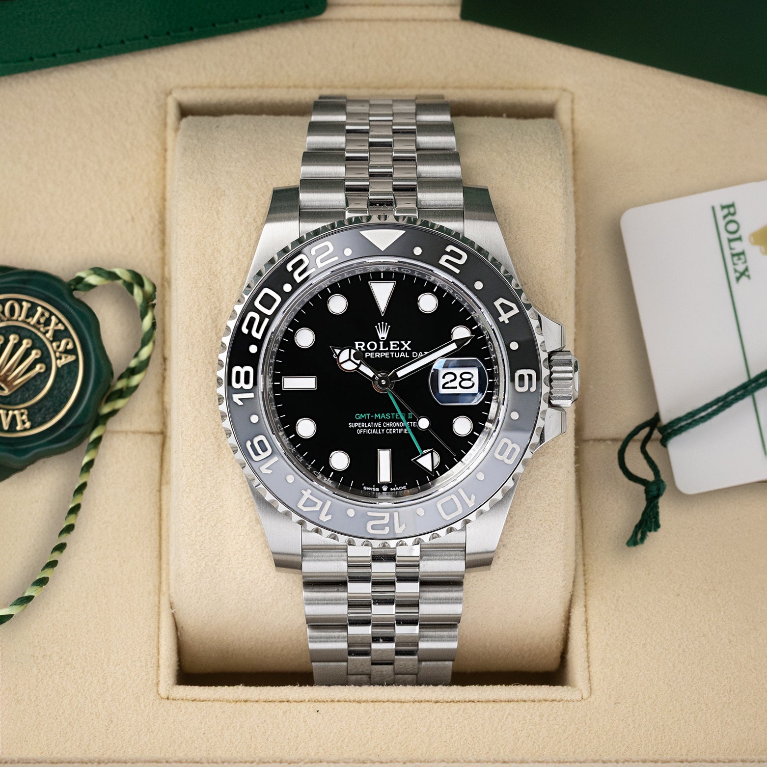 Preowned 2025 Rolex GMT-Master II Bruce Wayne 126710GRNR black and grey bezel watch at Noah's Fine Watches & Jewelry in Dallas, TX