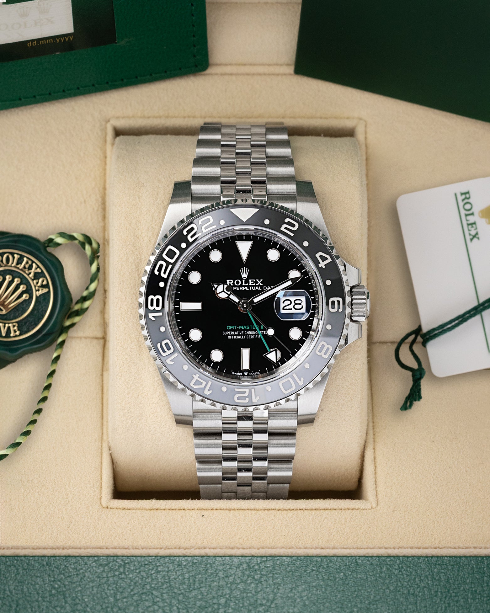 Preowned 2025 Rolex GMT-Master II Bruce Wayne 126710GRNR black and grey bezel watch at Noah's Fine Watches & Jewelry in Dallas, TX