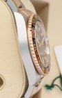 Polished Oystersteel case side view of pre-owned 2026 Rolex GMT-Master II reference 126711CHNR