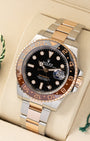 Angled view of pre owned 2026 Rolex GMT-Master II ref 126711CHNR featuring two-color black and brown Cerachrom ceramic bezel and black dial
