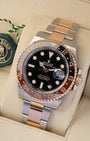 Angled view of preowned 2023 Rolex GMT-Master II ref 126711CHNR featuring two-color black and brown Cerachrom ceramic bezel and black dial