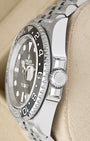 Oystersteel case profile view showcasing the crown guards and Triplock winding crown on a 40mm Rolex GMT-Master II