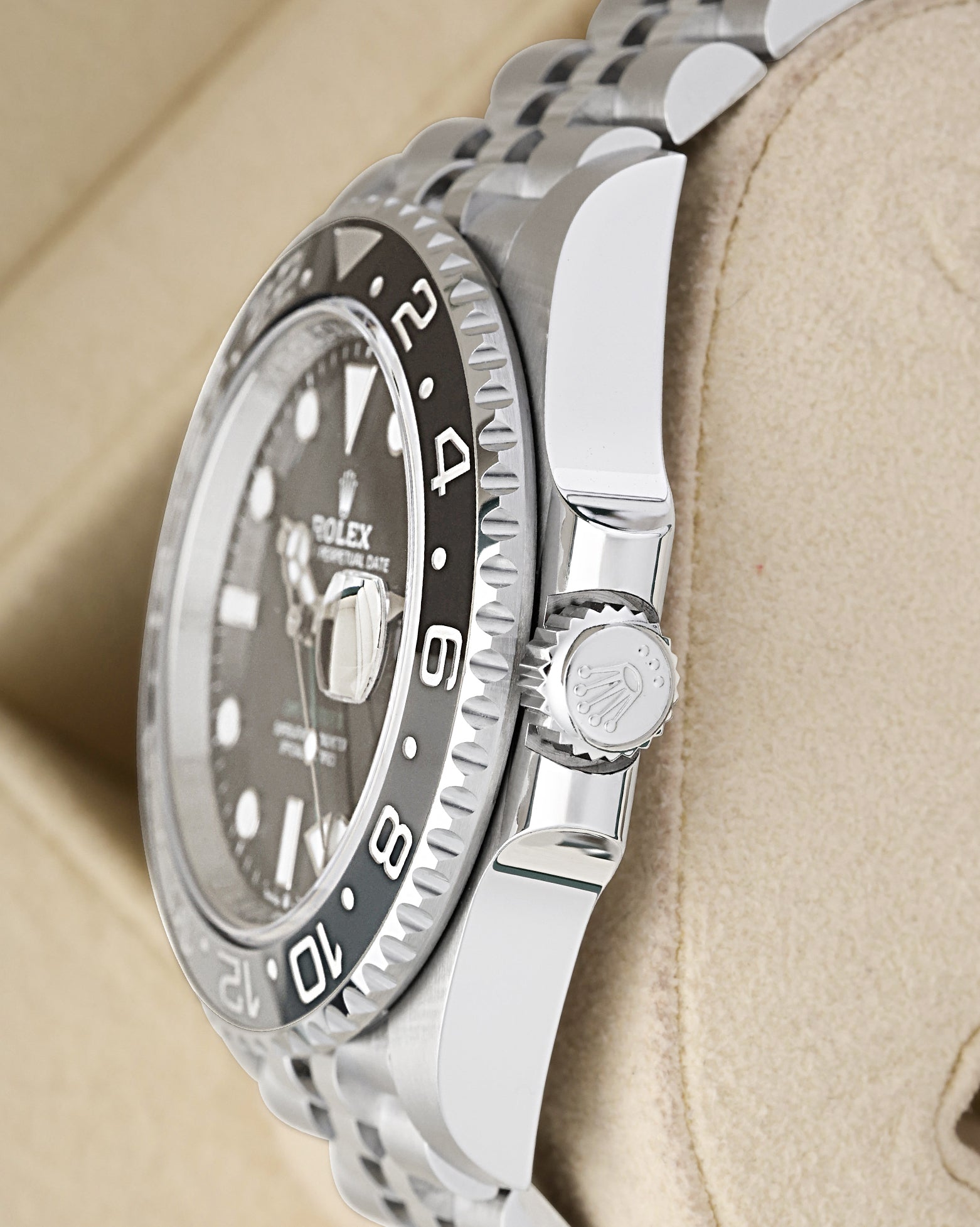 Oystersteel case profile view showcasing the crown guards and Triplock winding crown on a 40mm Rolex GMT-Master II