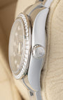 Close-up right profile view of the 26mm Rolex Lady-Datejust 179384 case highlighting the factory diamond-set bezel and winding crown