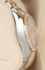 Left side profile view highlighting the polished stainless steel case and 18k yellow gold diamond bezel profile on a 2022 Rolex Lady-Datejust reference 279383RBR