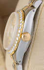 Right side profile view of the 1979 vintage Rolex Lady-Datejust 6917 case highlighting the raised acrylic crystal, diamond bezel, and gold winding crown.