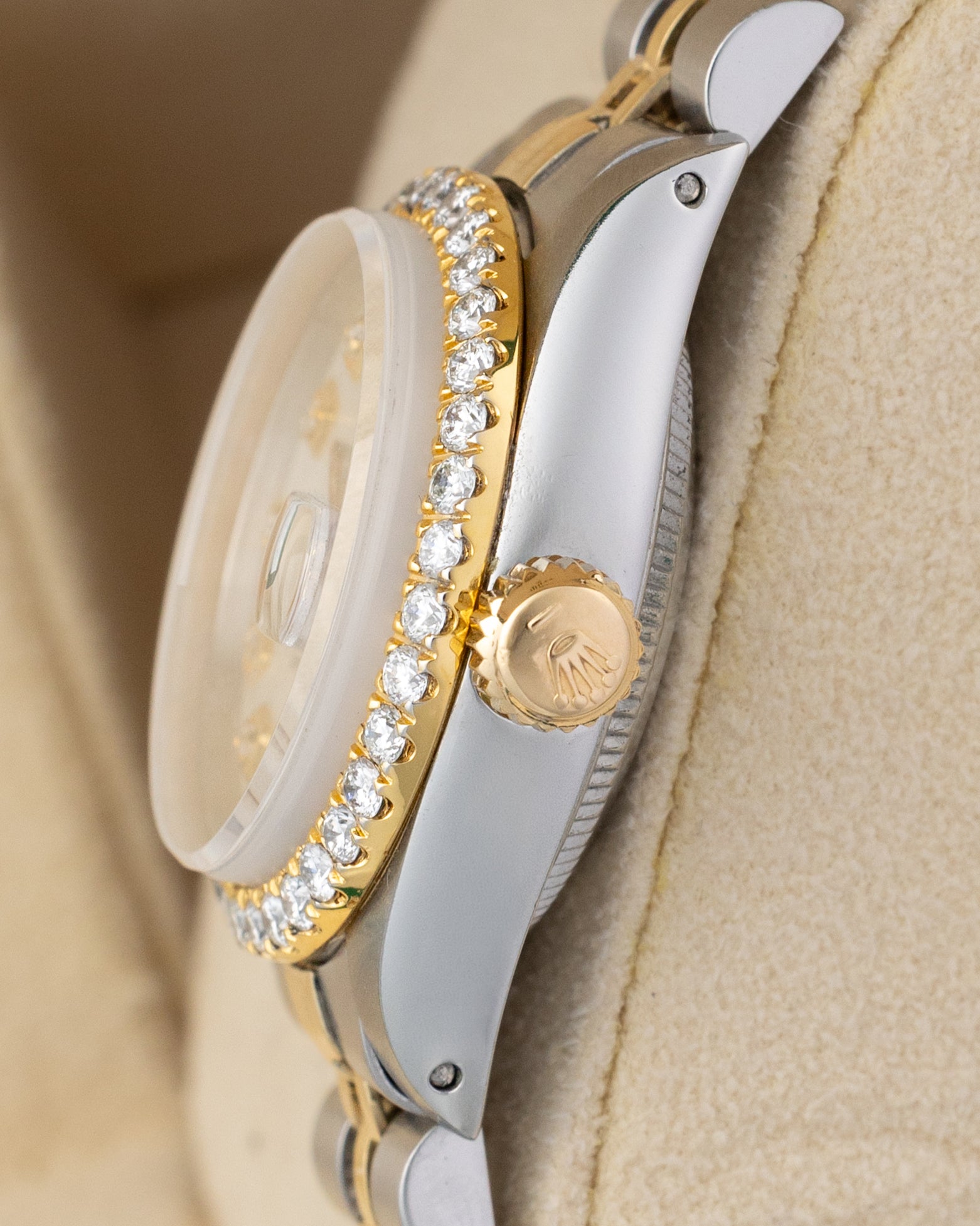 Right side profile view of the 1979 vintage Rolex Lady-Datejust 6917 case highlighting the raised acrylic crystal, diamond bezel, and gold winding crown.