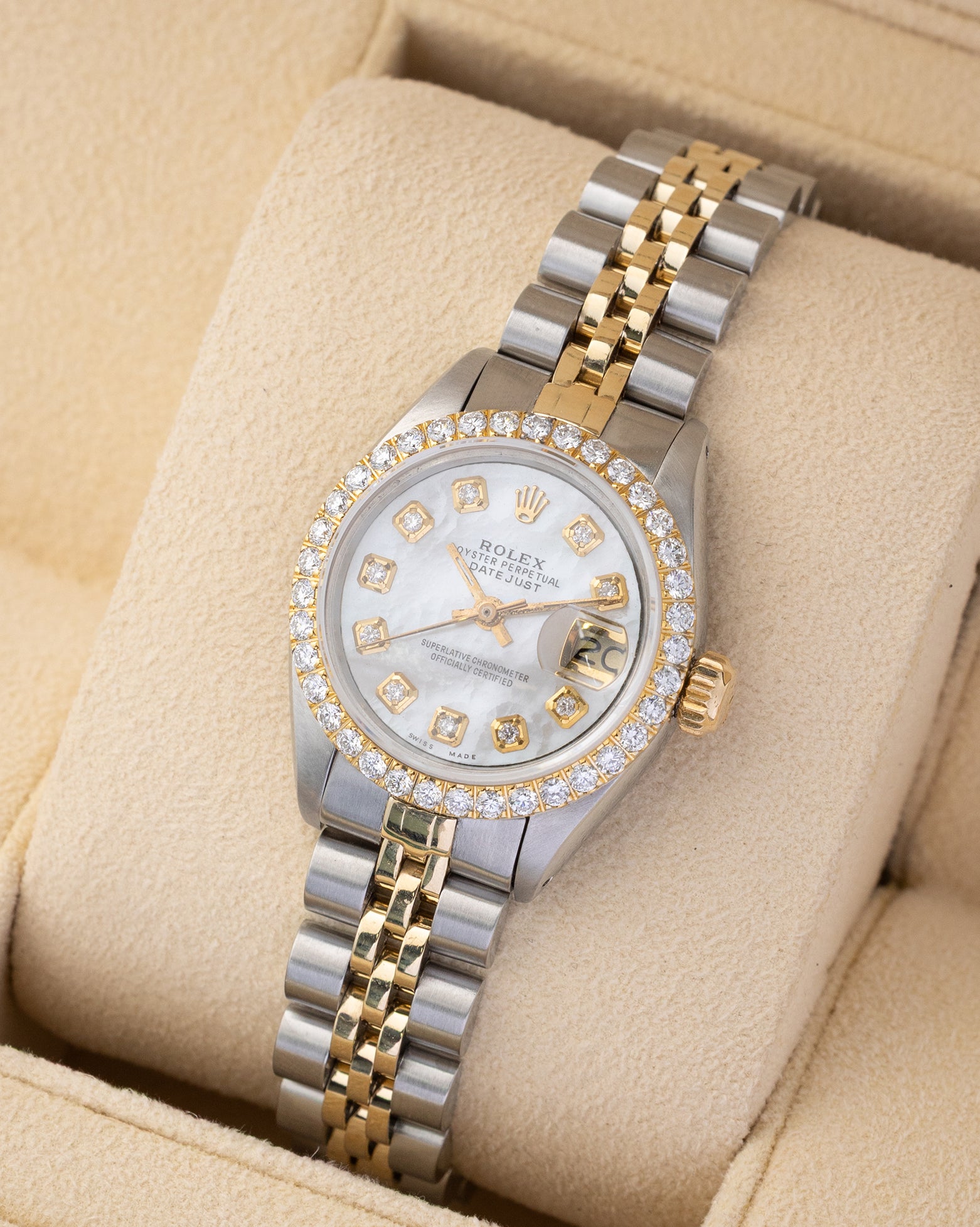 Angled shot of a 1979 Rolex Lady-Datejust 26mm 6917 showing the mother of pearl dial, diamond hour markers, and two-tone Jubilee bracelet.