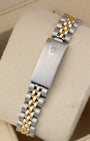 Stainless steel and yellow gold Jubilee folding clasp mounted on a beige watch cushion for the 1979 vintage Rolex Lady-Datejust 6917.