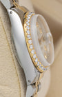 Left side profile view showing the stainless steel case with visible lug holes on a 1979 Rolex Lady-Datejust reference 6917.