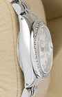 Polished left-side case profile view of a vintage stainless steel 26mm Rolex Oyster case resting on a presentation cushion