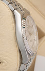 Left-side macro profile view showcasing the fine satin-brushed caseband finish and the continuous, smooth integrated lug design character exclusive to the Land-Dweller collection