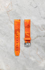 Additional custom orange camouflage rubber watch strap included with the 2019 Rolex Milgauss 116400GV set