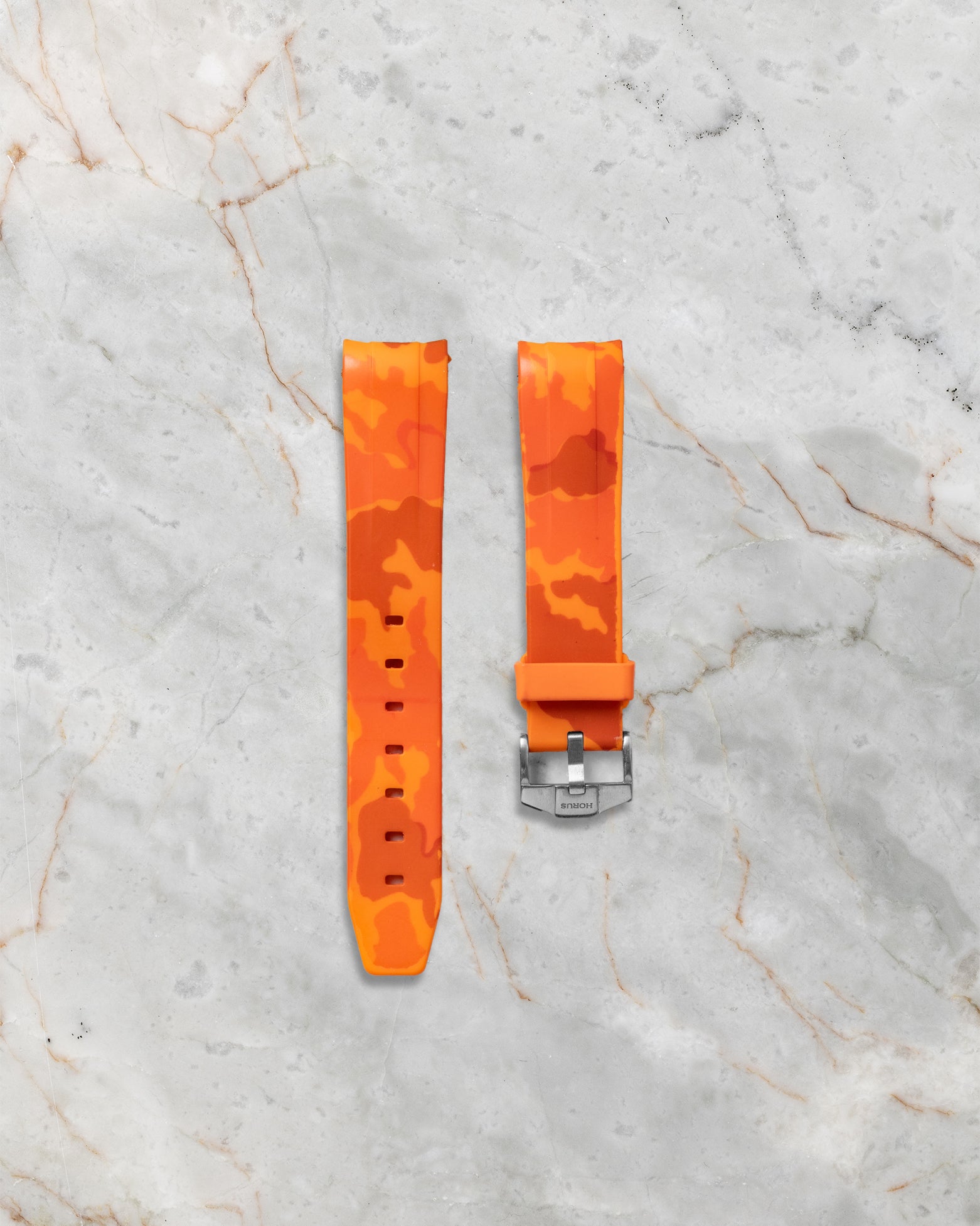 Additional custom orange camouflage rubber watch strap included with the 2019 Rolex Milgauss 116400GV set