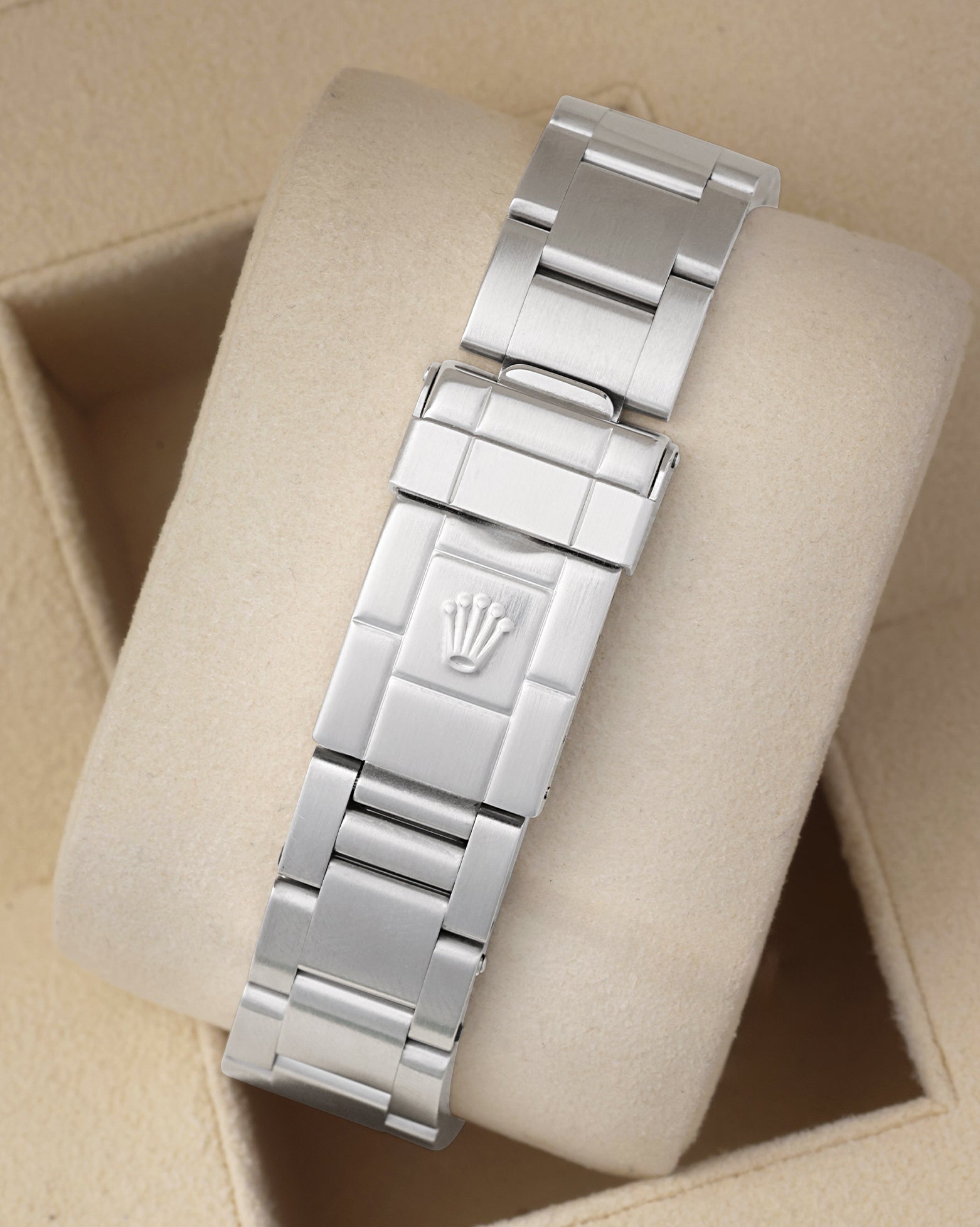 Rear studio view of the stainless steel Rolex Oyster watch bracelet highlighting the folding Oysterlock safety clasp with embossed coronet