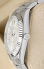 Macro case profile showing the pristine 18k white gold fluted bezel teeth and the patented Twinlock double-waterproofness screw-down crown system