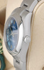 Side profile view of the stainless steel Rolex 177200 case showing the smooth domed bezel and signed screw-down crown