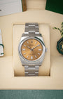 Pre-owned 2019 Rolex Oyster Perpetual 36 ref 116000 with rare white grape sunray dial, box, and papers at Noah's Fine Watches & Jewelry in Dallas, Texas
