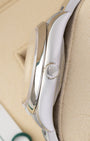 Side profile view showing the Twinlock winding crown and stainless steel case of a 36mm Rolex Oyster Perpetual 116000