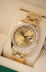 portrait of the 39mm yellow gold masterwork case showcasing the texturing of the round brilliant cut bezel diamonds and the arc-shaped day window