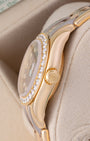 ide profile view of 18k yellow gold case, diamond bezel, and winding crown on pre-owned Rolex Pearlmaster 80298