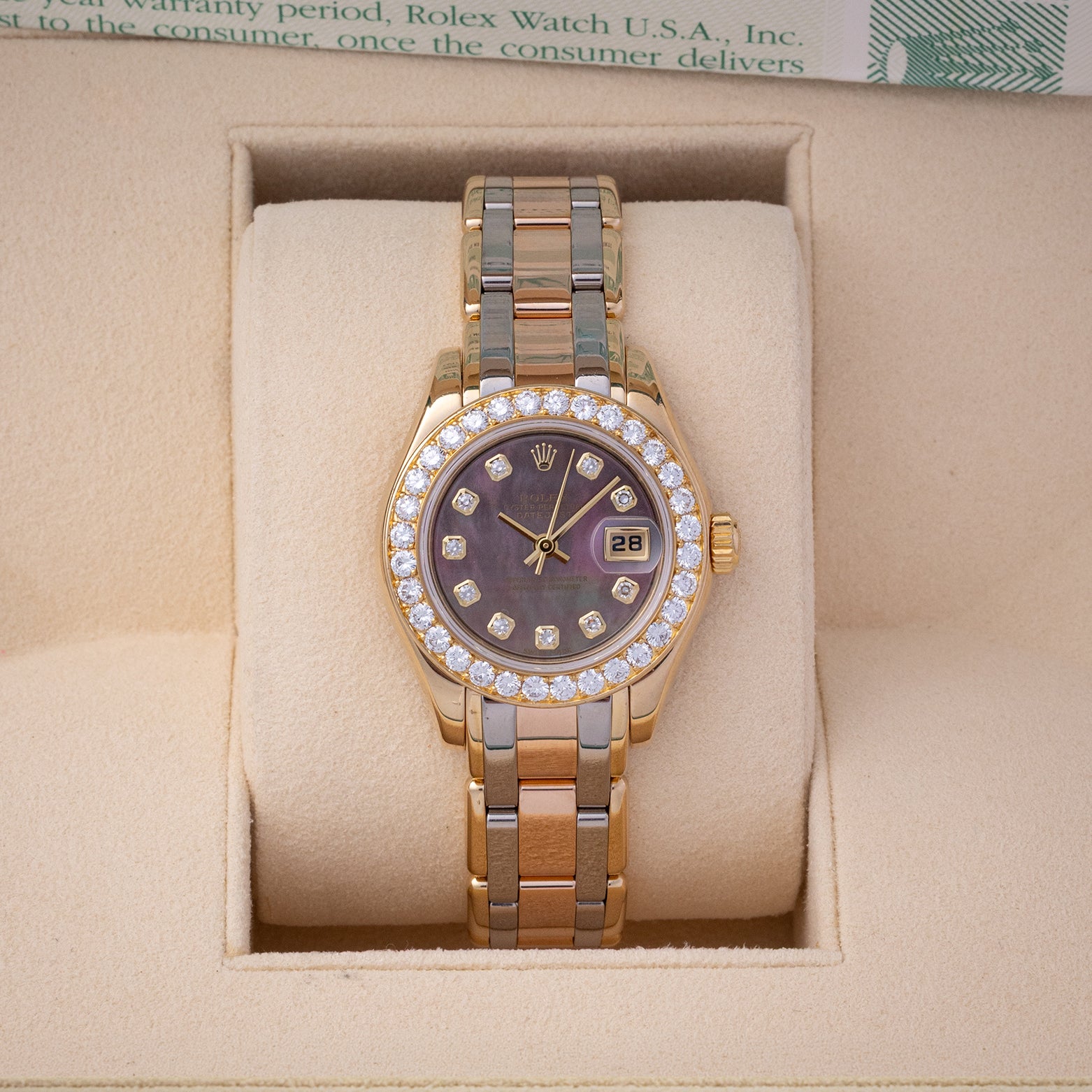 Pre owned 2001 Rolex Pearlmaster 80298 18k yellow gold with black mother of pearl diamond Serti dial at Noah's Fine Watches Dallas
