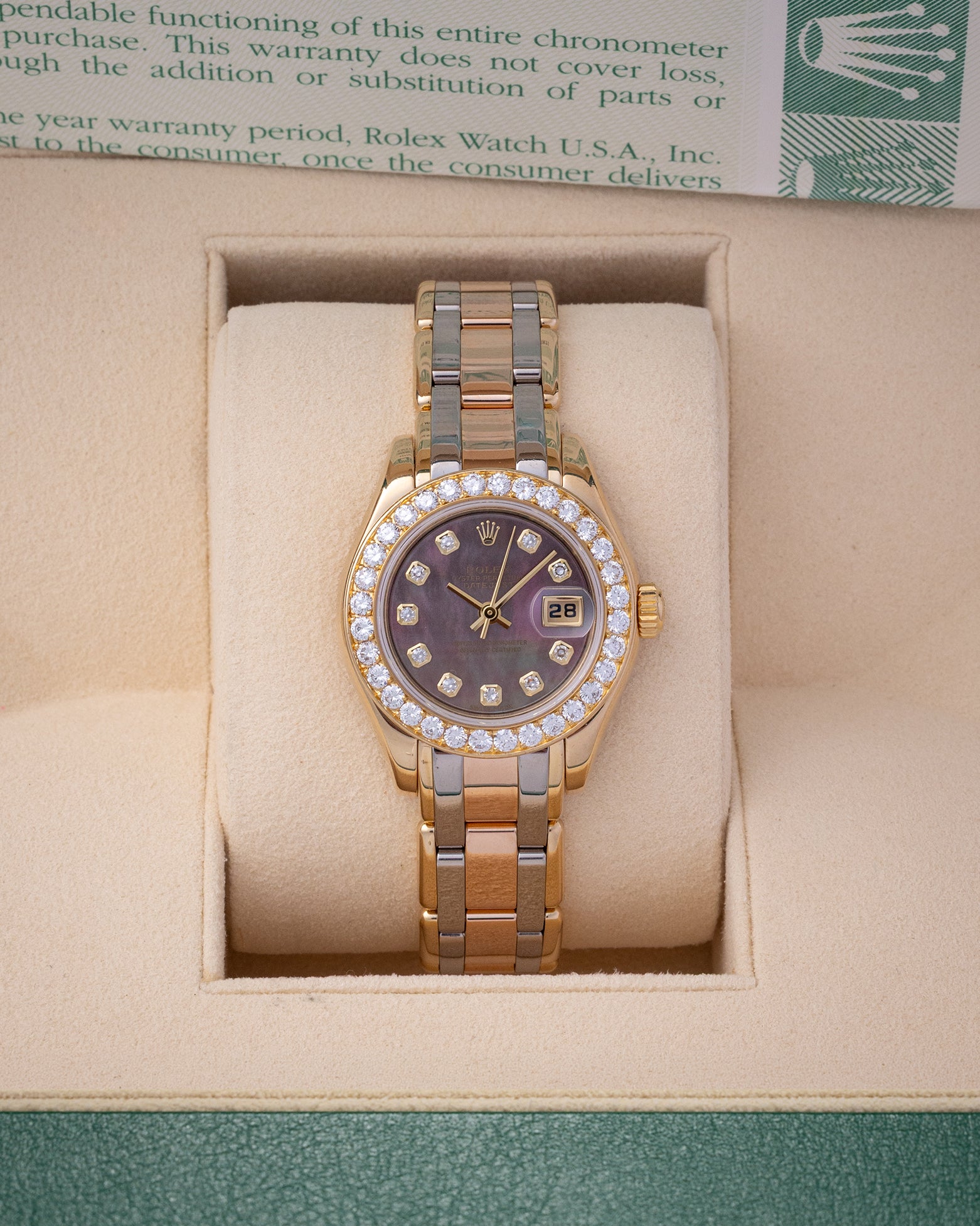 Pre owned 2001 Rolex Pearlmaster 80298 18k yellow gold with black mother of pearl diamond Serti dial at Noah's Fine Watches Dallas