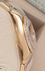 Polished 18k gold side case profile and diamond bezel profile of Rolex Pearlmaster 80298