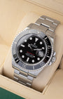 Angled shot of a 2019 Rolex Sea-Dweller 43mm reference 126600 showing black Cerachrom bezel and stainless steel Oyster bracelet.