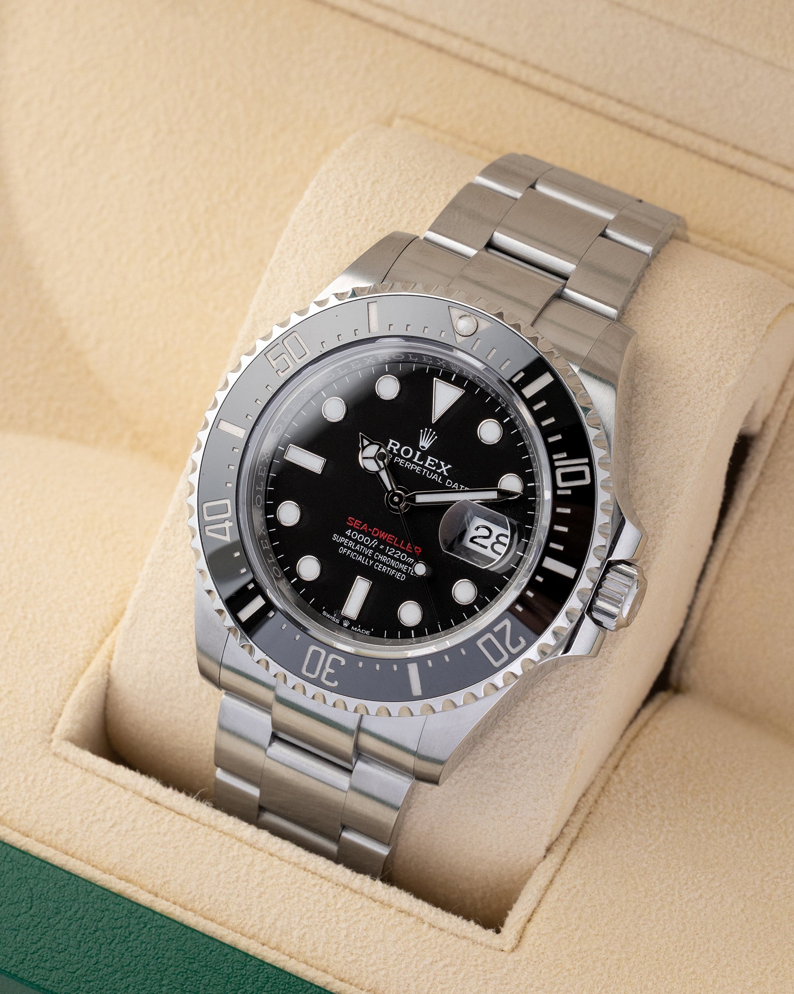 Angled shot of a 2019 Rolex Sea-Dweller 43mm reference 126600 showing black Cerachrom bezel and stainless steel Oyster bracelet.
