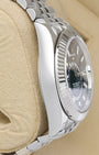 Polished left-side case profile view of a pre-owned 42mm Oystersteel Rolex Sky-Dweller watch case resting on a presentation cushion