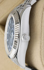 Satin and polished stainless steel case profile view showcasing the screw-down winding crown on a 42mm Rolex Sky-Dweller