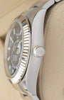 Close-up right profile view of the 42mm Rolex Sky-Dweller 336934 case highlighting the white gold Ring Command bezel and crown