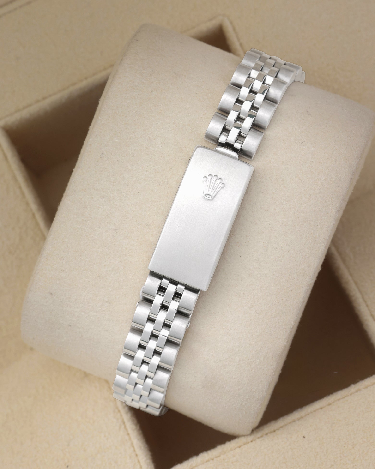 Rear view of the stainless steel Rolex Jubilee bracelet highlighting the classic folding clasp with the embossed Rolex crown logo