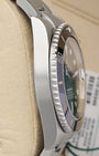Left-side macro profile view showcasing the immaculate satin-brushed finish across the sports case band wall and the clean, solid sweep of the integrated endlinks
