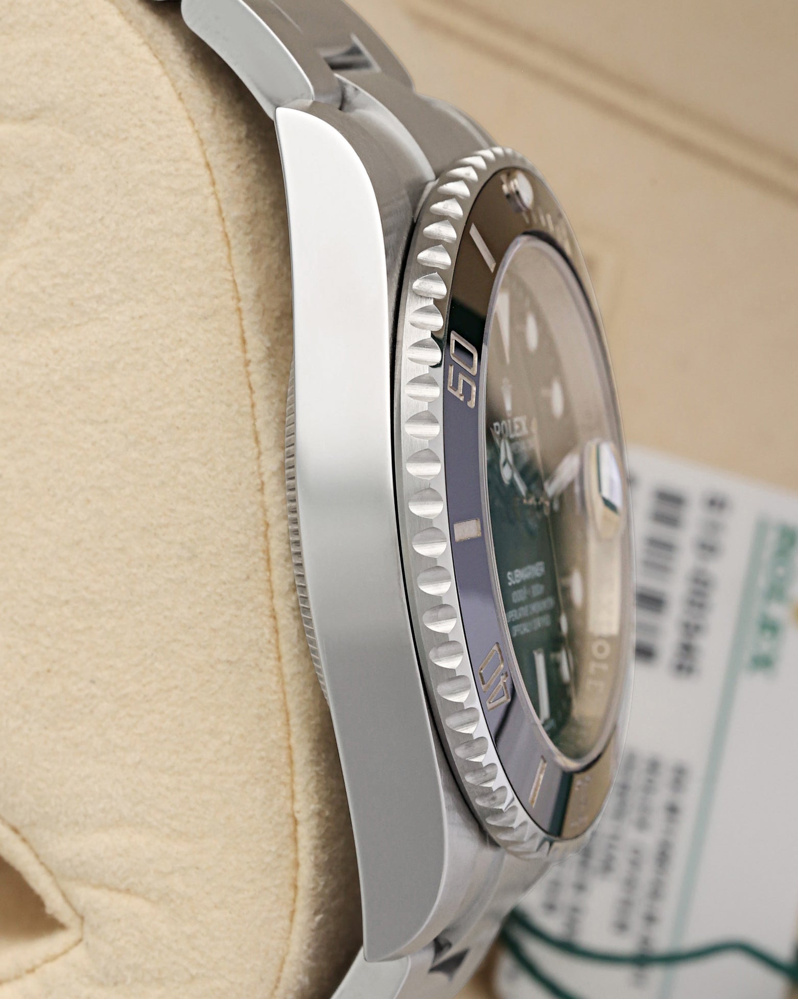 Left-side macro profile view showcasing the immaculate satin-brushed finish across the sports case band wall and the clean, solid sweep of the integrated endlinks