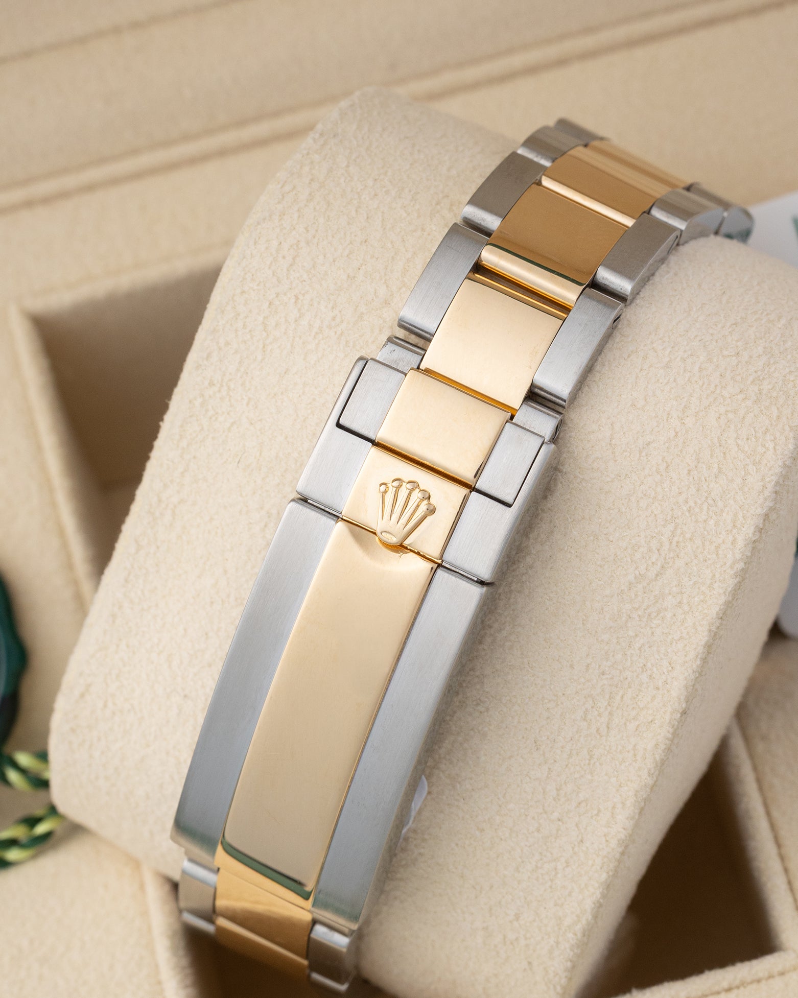 Back view showing the two-tone 18k yellow gold and stainless steel Oysterlock safety clasp with Glidelock extension system on a 2018 Rolex Submariner 116613LB