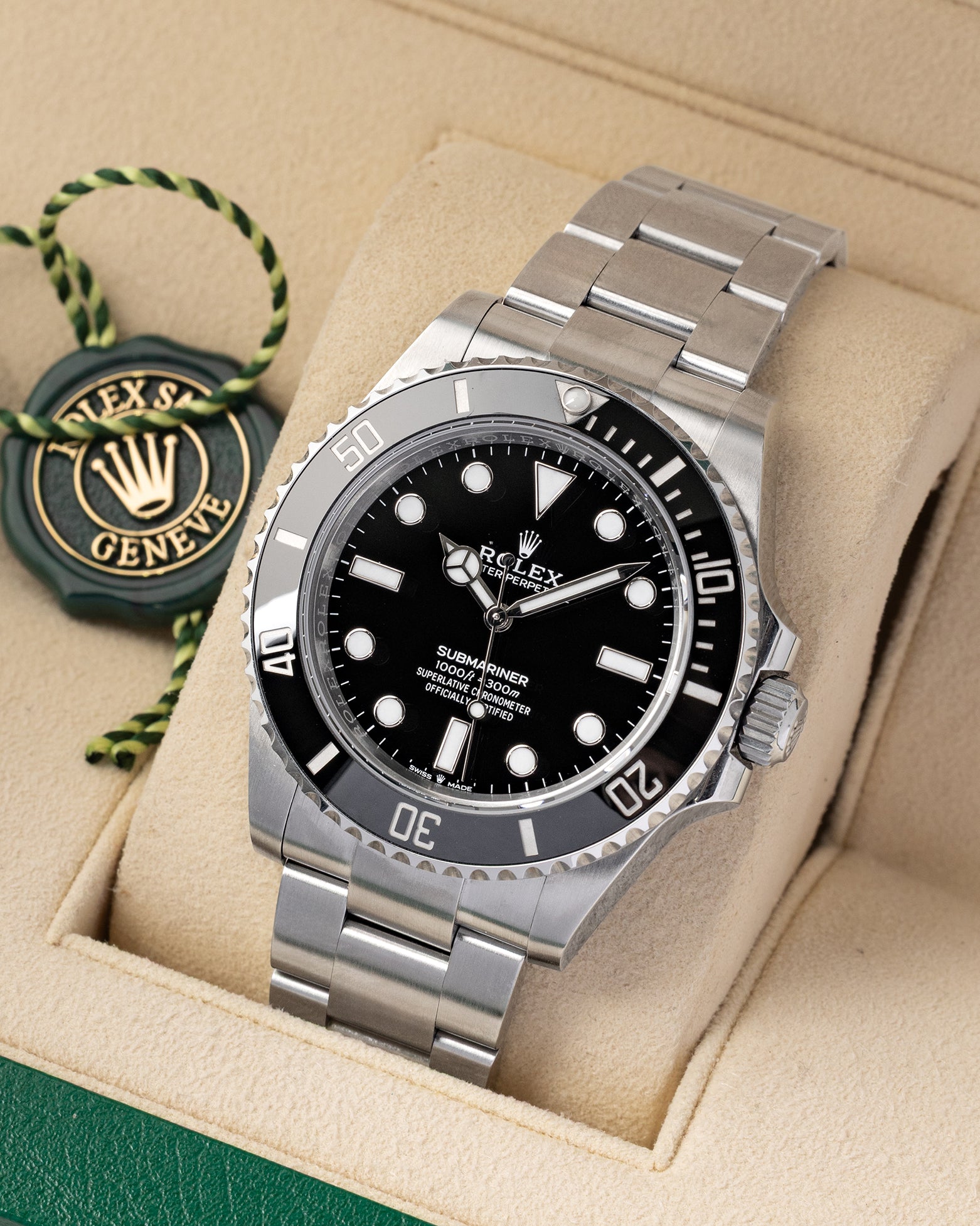 e-commerce portrait of the 41mm Rolex Submariner case showcasing its refined, slimmer tapered lugs and wide satin-brushed Oystersteel bracelet links