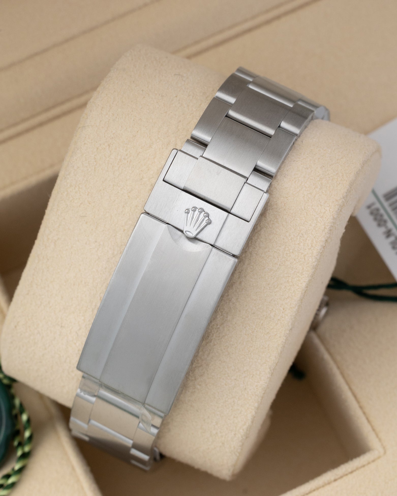 Back view showing the stainless steel Oysterlock safety clasp with Glidelock adjustment system on a 2025 Rolex Submariner 126610LN
