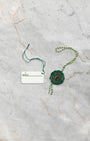 Official green Rolex Superlative Chronometer hang tag and white serial price tag for Submariner Date 126610LN