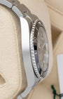 Left side profile view of the polished and brushed Oystersteel case on a 2026 Rolex Submariner Date reference 126610LN