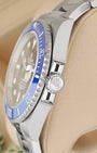 Side view close-up of the 18k white gold Triplock crown and blue ceramic bezel on Rolex Submariner Date 126619LB