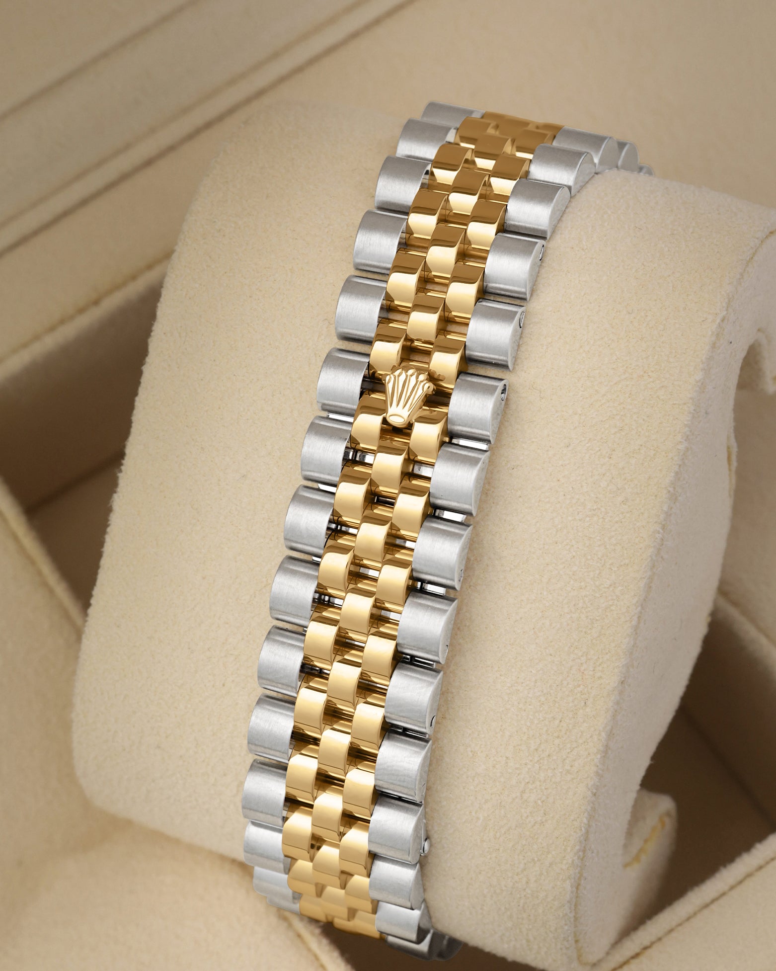 Rear perspective of the classic five-piece link yellow Rolesor two-tone Jubilee bracelet featuring the sleek hidden Crownclasp design