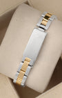 Rear studio view of the flat-link two-tone steel and yellow gold Rolex Oyster bracelet highlighting the vintage folding clasp