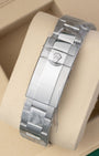 Unworn Rolex Oysterlock safety clasp on an Oyster bracelet with clear factory protective stickers for reference 126680.