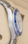 Left side profile view displaying the polished 44mm stainless steel case and blue ceramic Ring Command bezel of an unworn 2026 Rolex Yacht-Master II.