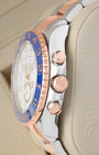 Right side profile view highlighting the 18k Everose gold crown, chronograph pushers, and blue ceramic Ring Command bezel on a Rolex Yacht-Master II