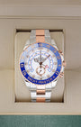 Rolex Yacht-Master II 44mm regatta chronograph watch in two-tone Everose Rolesor, model 116681, on display inside its box at Noah's Fine Watches & Jewelry in Dallas