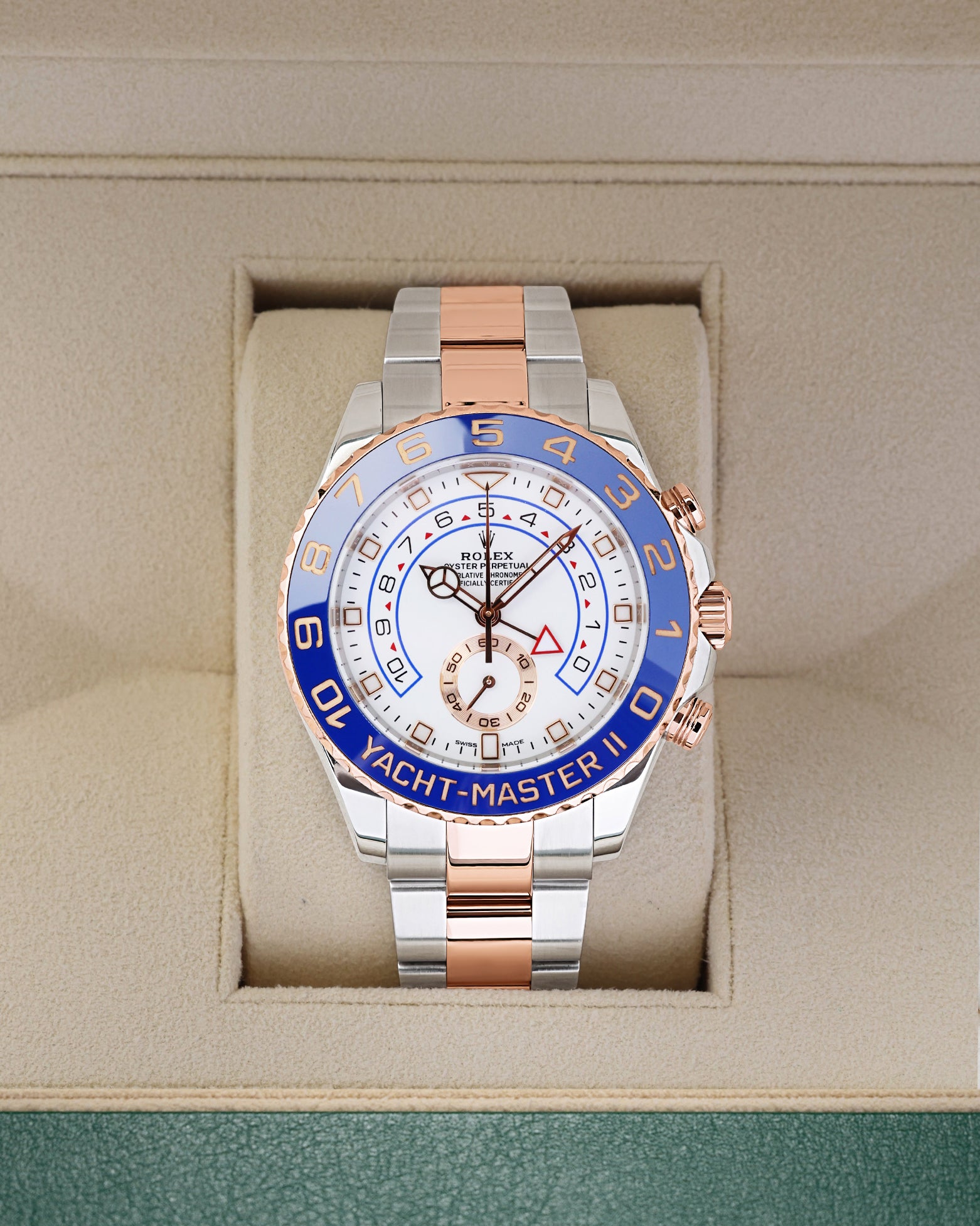 Rolex Yacht-Master II 44mm regatta chronograph watch in two-tone Everose Rolesor, model 116681, on display inside its box at Noah's Fine Watches & Jewelry in Dallas